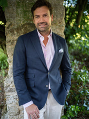 Man wearing a navy wool and cashmere blazer