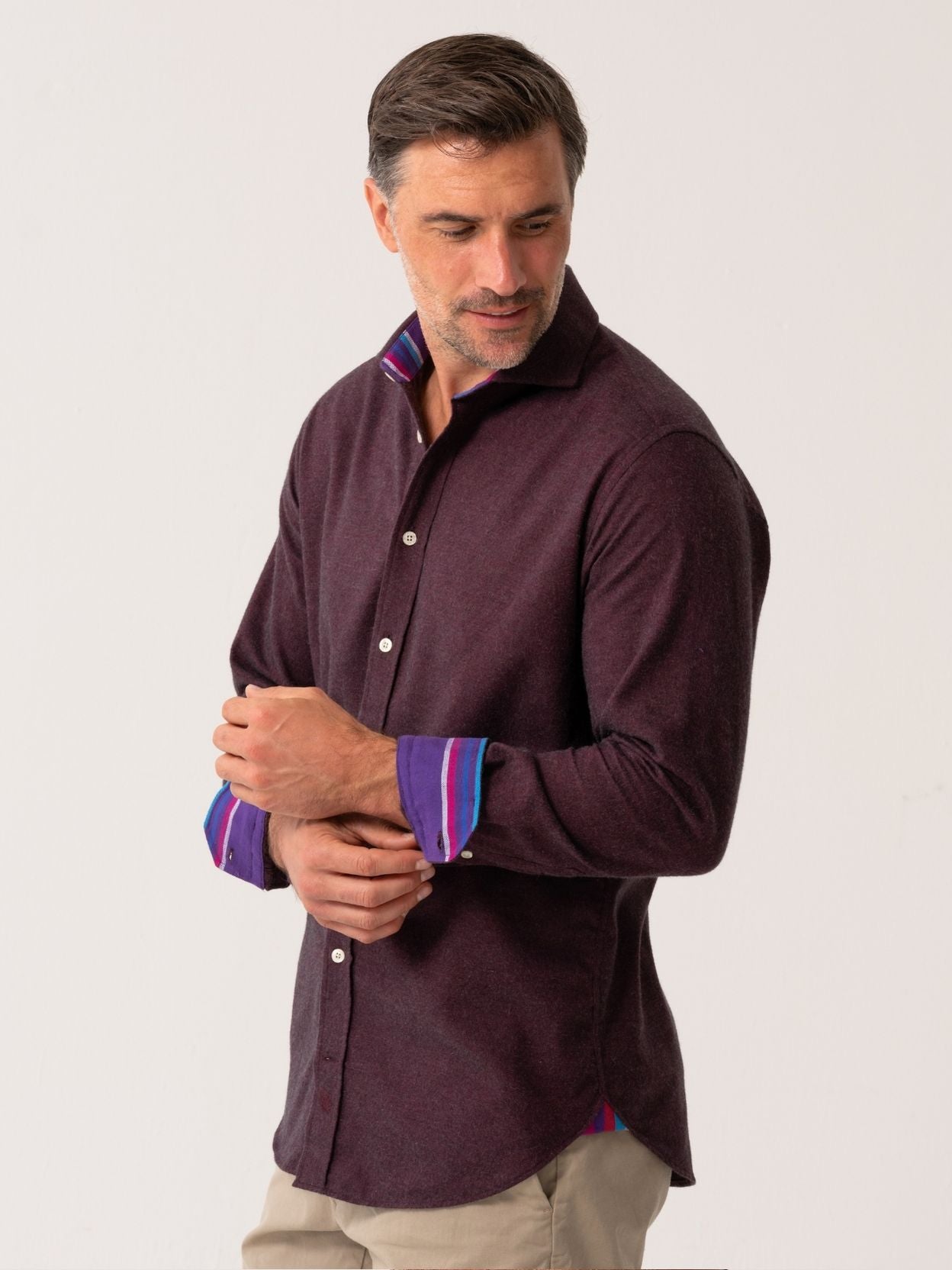 Man wearing a dark Burgundy Cotton-Cashmere shirt with colourful trim on a white background