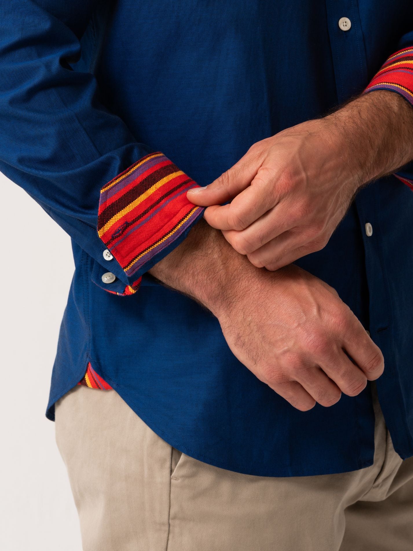 Mens Navy Oxford shirt with red Kenyan trim - cuff detail view 