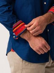 Mens Navy Oxford shirt with red Kenyan trim - cuff detail view 