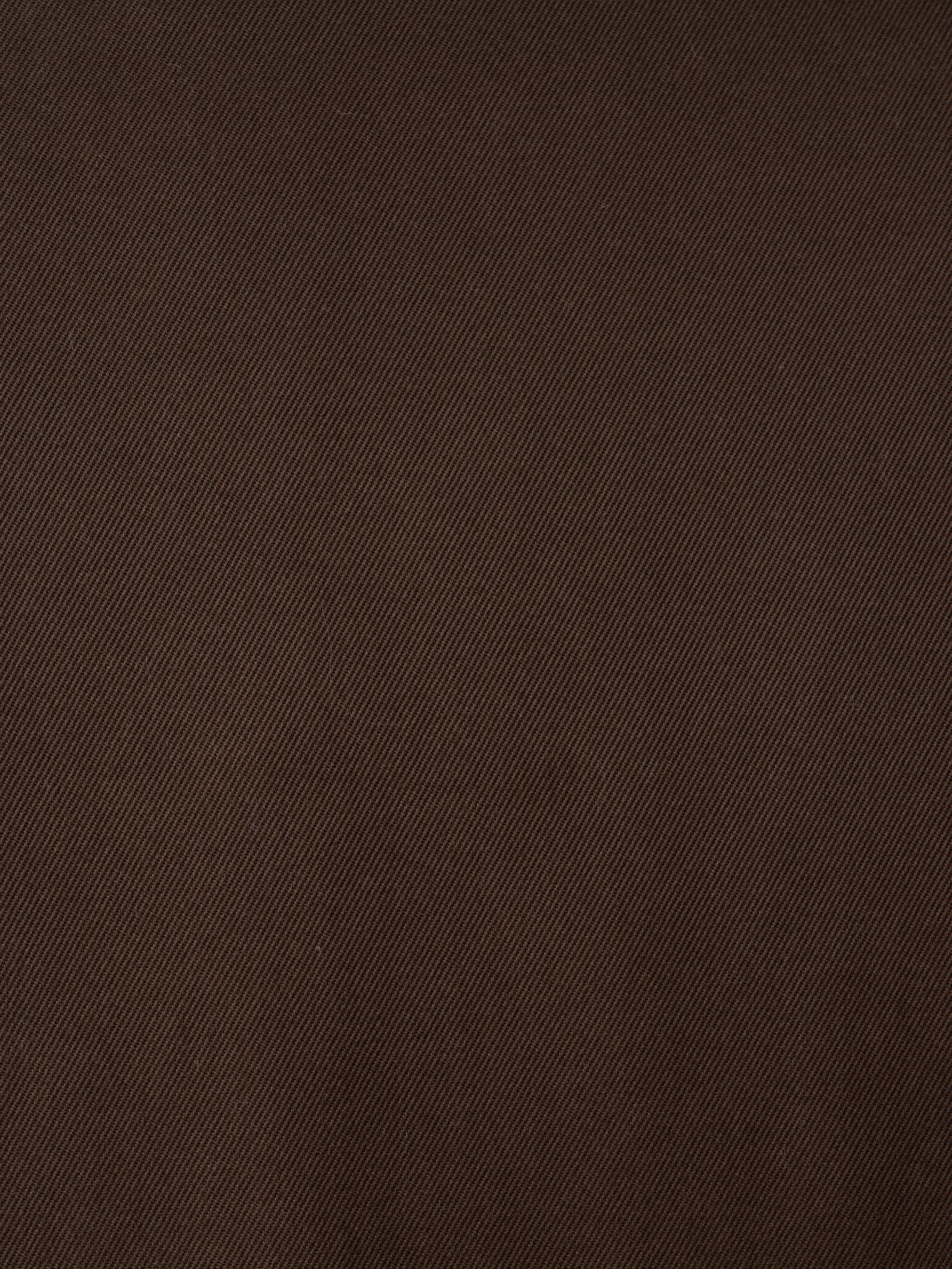 Mens outerwear coat in Dark Olive - fabric close up 