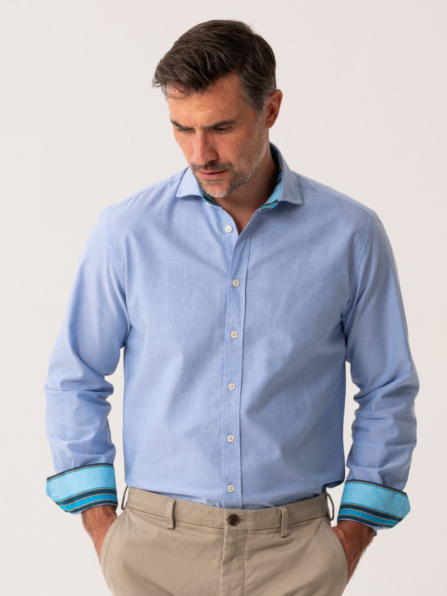 Mens Light Blue Oxford shirt made from organic cotton with colourful trim - front view 