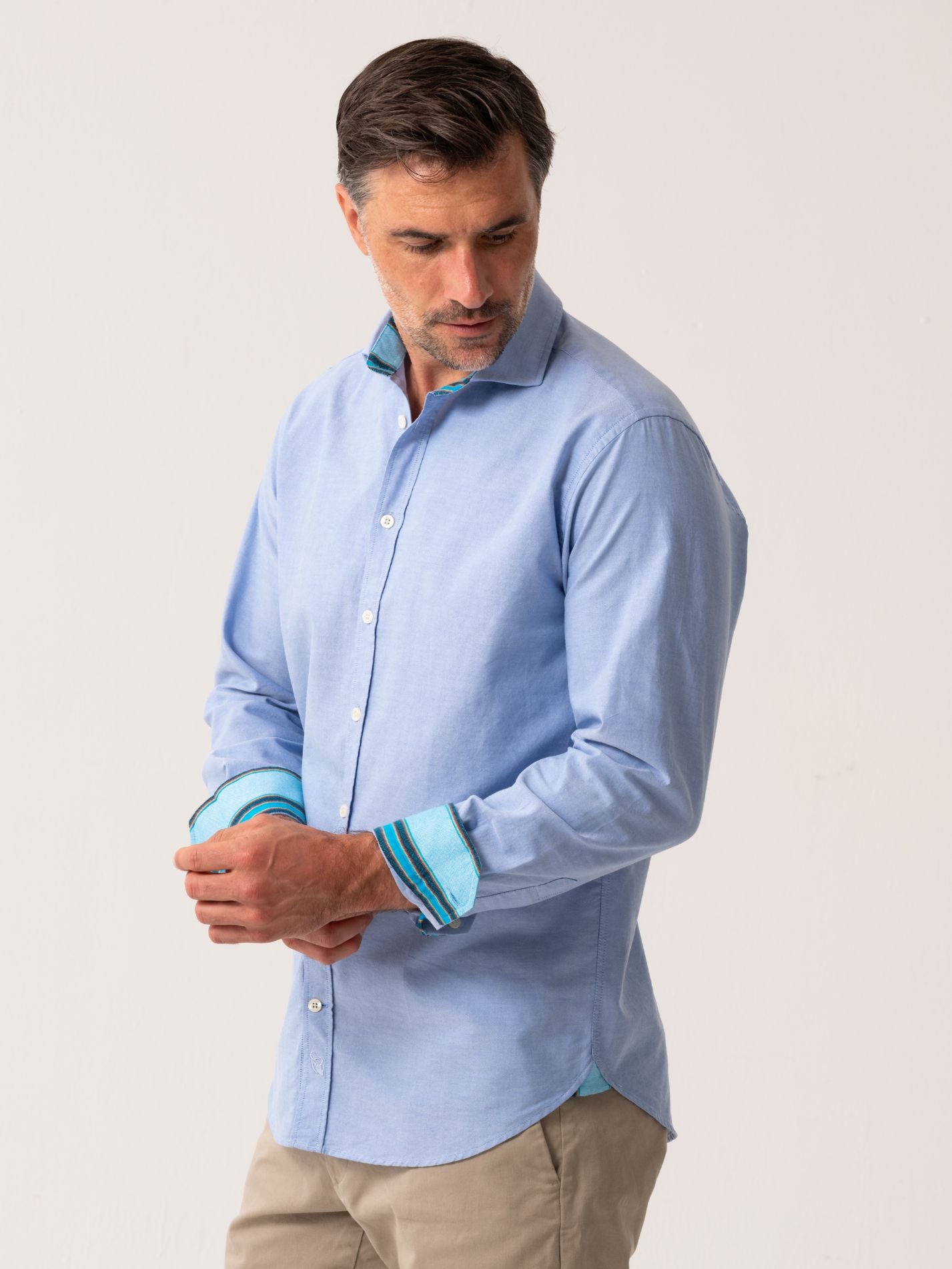 Mens Light Blue Oxford shirt made from organic cotton with colourful trim - side view 