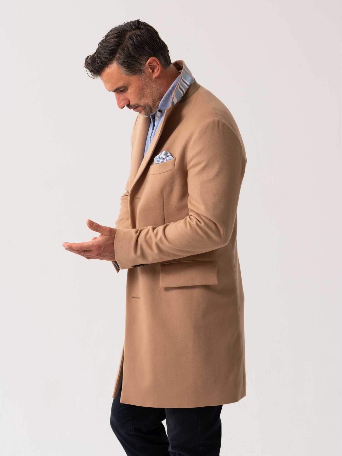 Side view of men’s camel wool overcoat