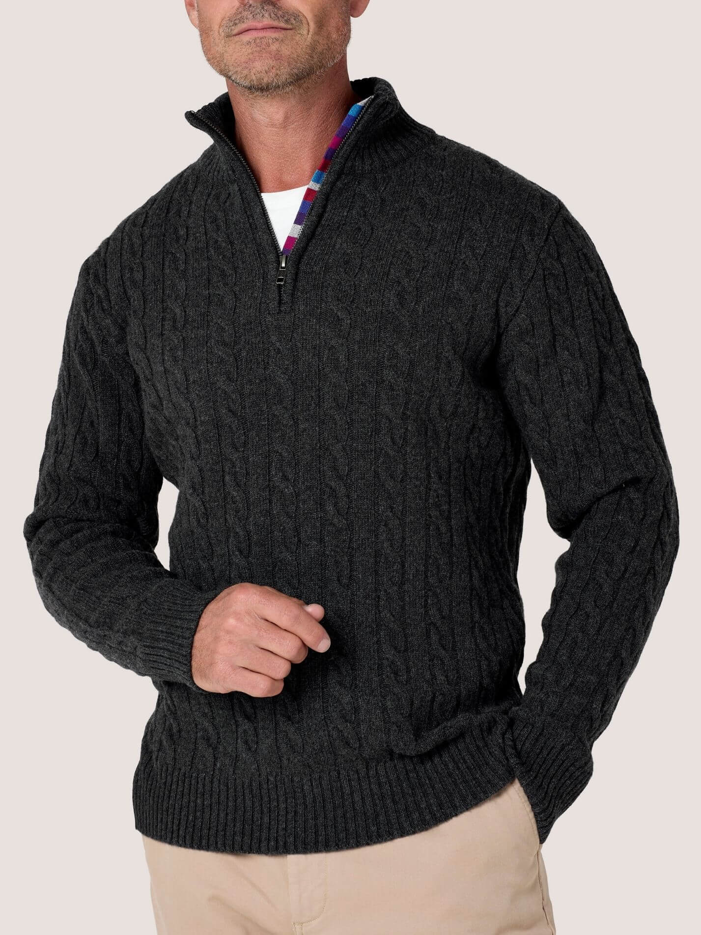 Charcoal cable knit quarter-zip jumper in Merino wool and cashmere, with Kenyan Kikoy trim inside the collar