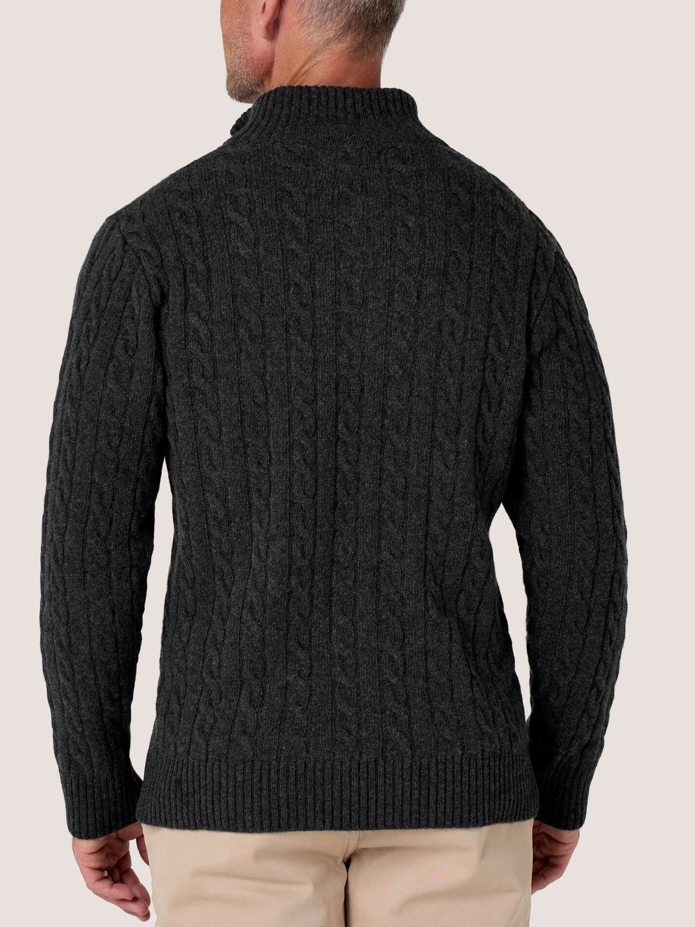 Charcoal cable knit quarter-zip jumper in Merino wool and cashmere, with Kenyan Kikoy trim inside the collar