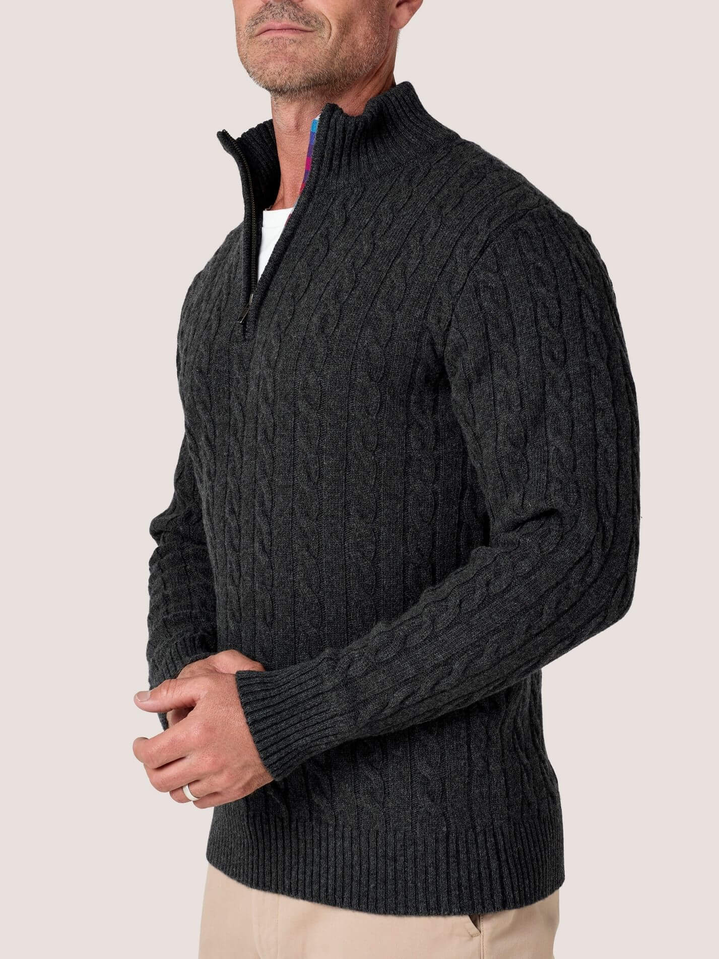 Charcoal cable knit quarter-zip jumper in Merino wool and cashmere, with Kenyan Kikoy trim inside the collar