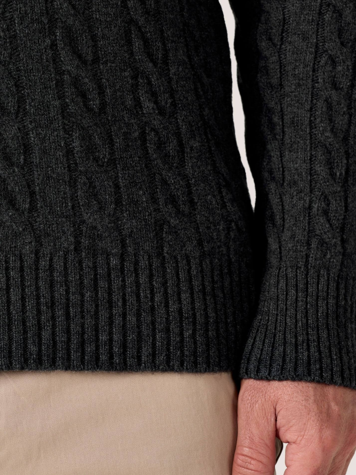 Charcoal cable knit quarter-zip jumper in Merino wool and cashmere, with Kenyan Kikoy trim inside the collar