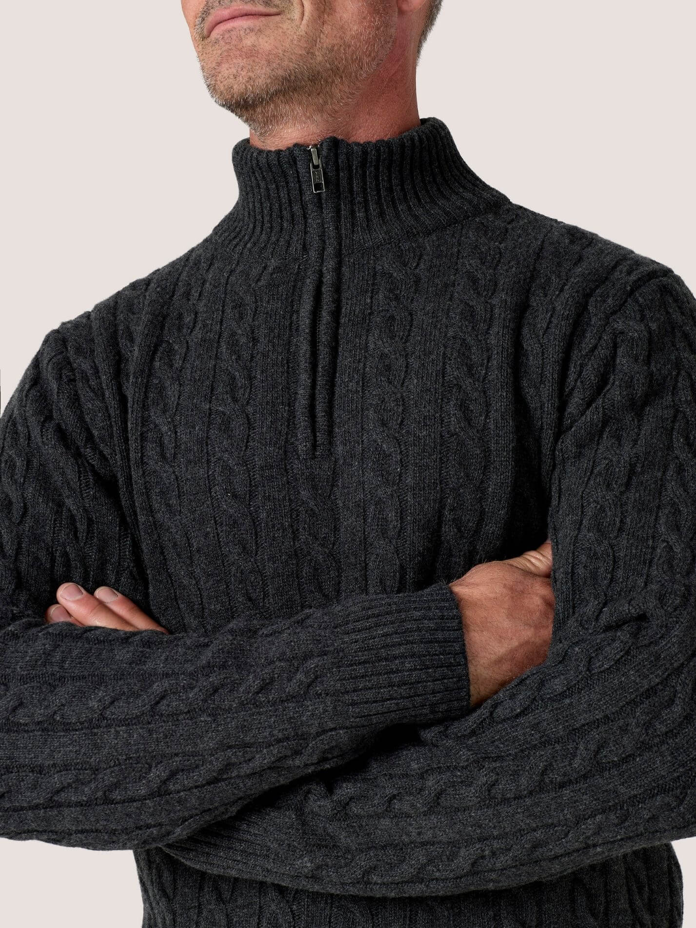 Charcoal cable knit quarter-zip jumper in Merino wool and cashmere, with Kenyan Kikoy trim inside the collar