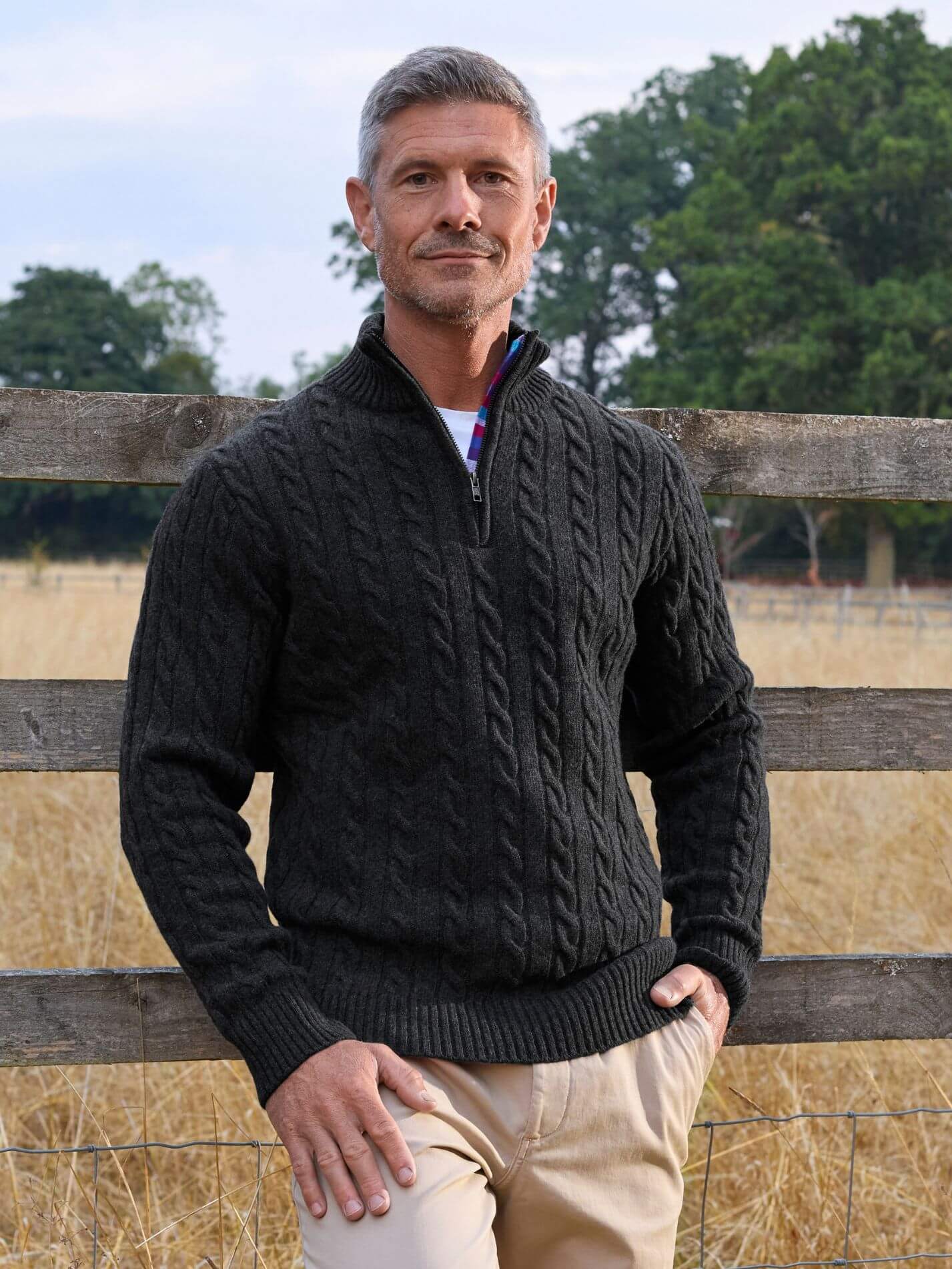 Charcoal cable knit quarter-zip jumper in Merino wool and cashmere, with Kenyan Kikoy trim inside the collar