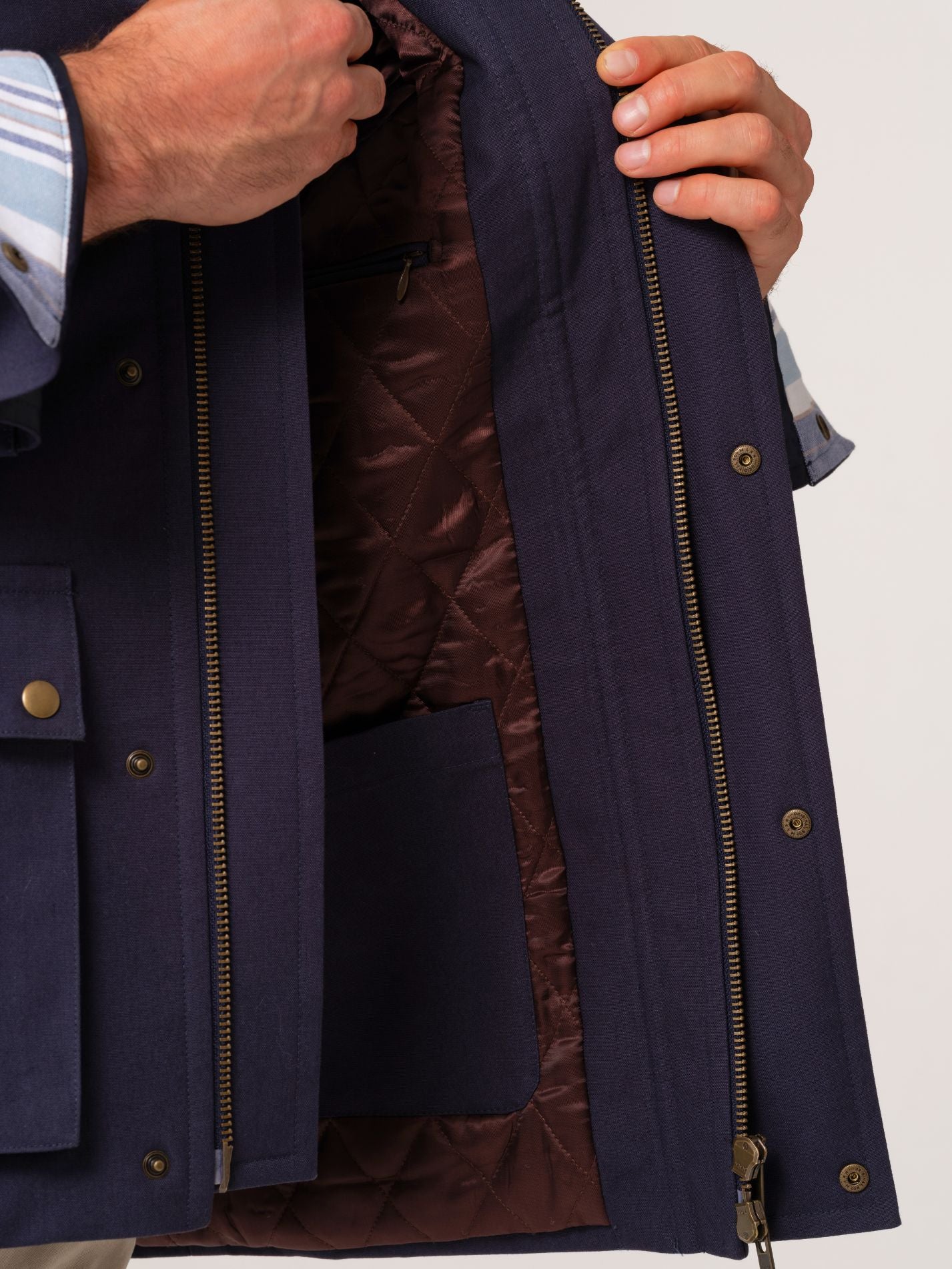 Mens navy outerwear coat with burgundy quilted lining