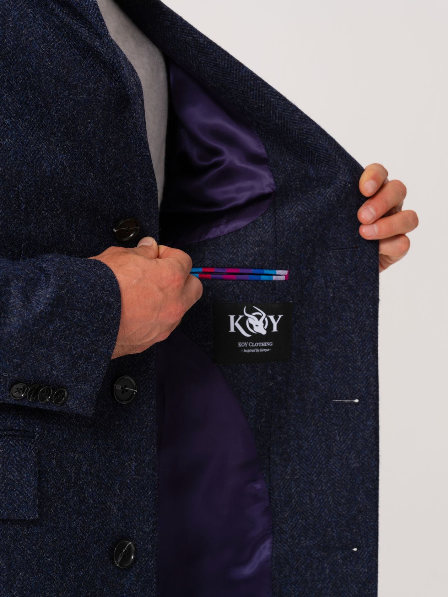 Inside lining and detail of navy wool overcoat