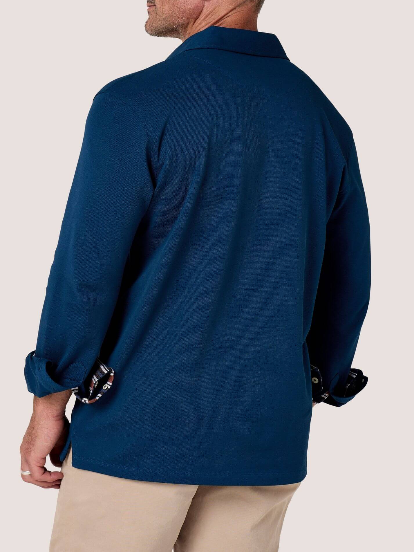 Navy long-sleeve Cotton Piqué polo shirt, Kenyan Kikoy trim on the front placket, cuffs and collar