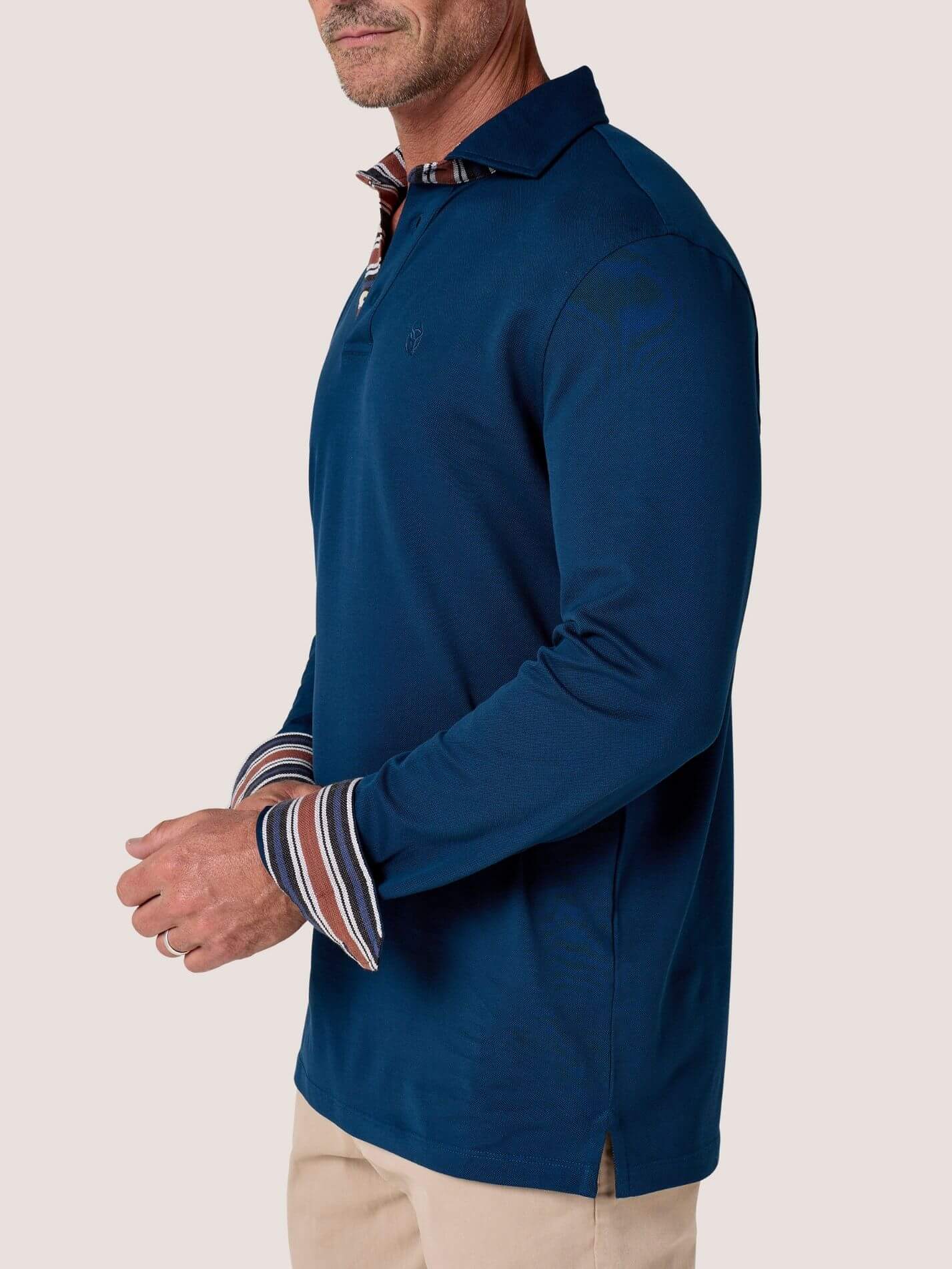 Navy long-sleeve Cotton Piqué polo shirt, Kenyan Kikoy trim on the front placket, cuffs and collar