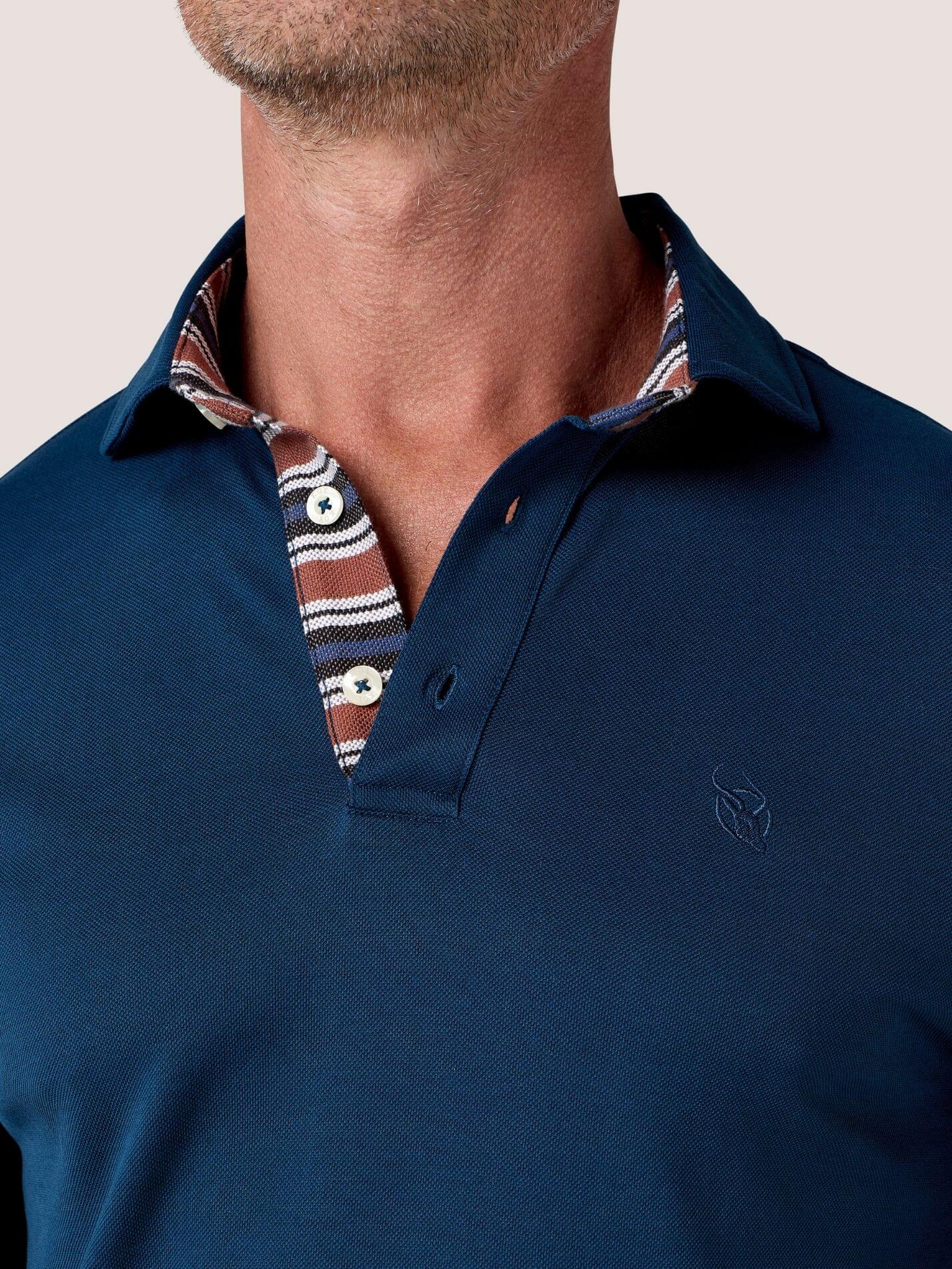 Navy long-sleeve Cotton Piqué polo shirt, Kenyan Kikoy trim on the front placket, cuffs and collar