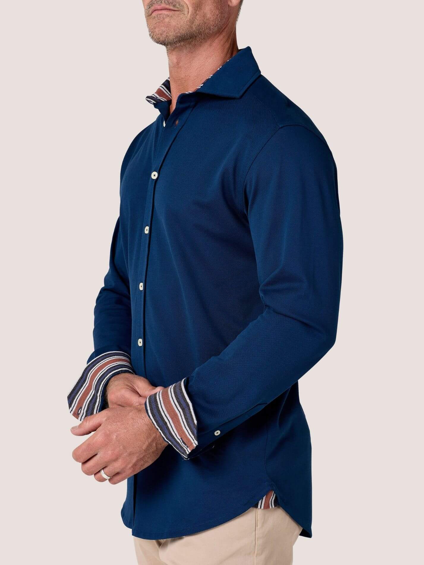 Navy Cotton Piqué shirt with cutaway collar, Kenyan Kikoy trim inside the collar, cuffs and side gusset