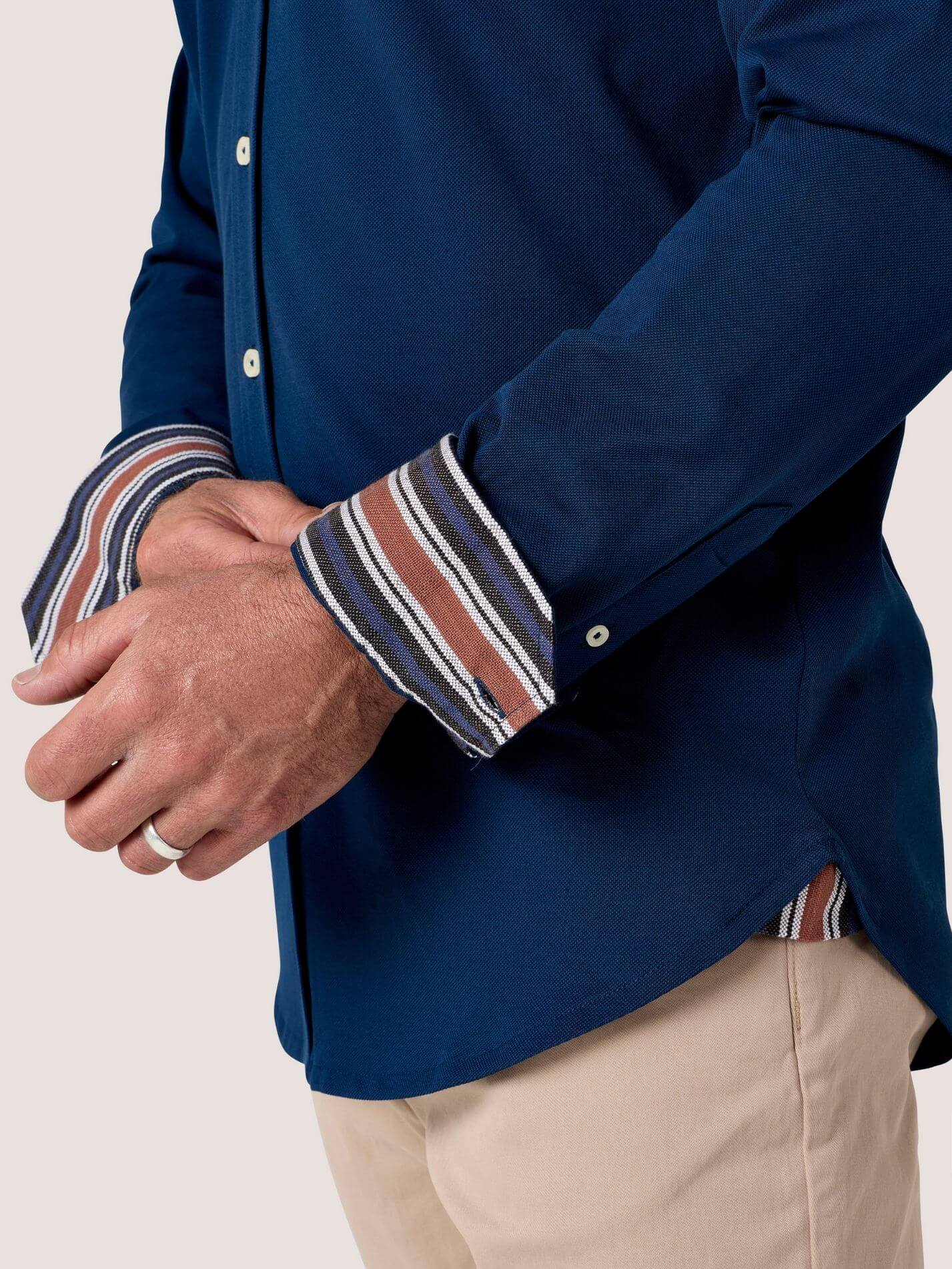 Navy Cotton Piqué shirt with cutaway collar, Kenyan Kikoy trim inside the collar, cuffs and side gusset