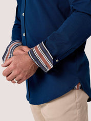 Navy Cotton Piqué shirt with cutaway collar, Kenyan Kikoy trim inside the collar, cuffs and side gusset