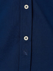 Navy Cotton Piqué shirt with cutaway collar, Kenyan Kikoy trim inside the collar, cuffs and side gusset