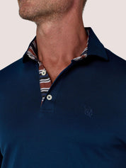 Navy short-sleeve Cotton Piqué polo shirt, Kenyan Kikoy trim on the front placket and collar