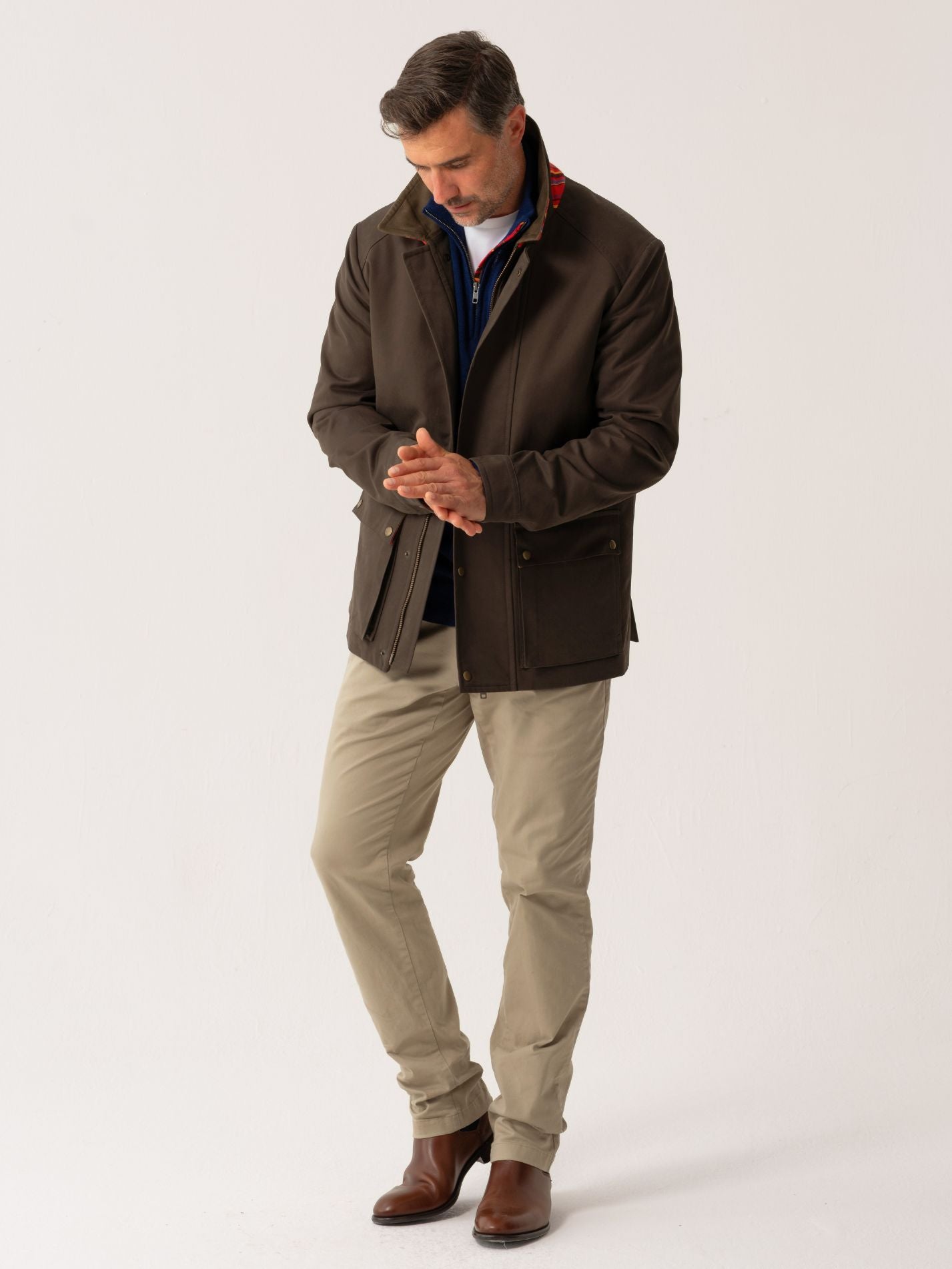Mens outerwear coat in Dark Olive with African fabric detail - full body front view on plain background 