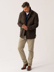 Mens outerwear coat in Dark Olive with African fabric detail - full body front view on plain background 