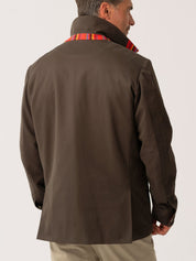 Mens outerwear coat in Dark Olive with African fabric detail - back view on plain background 