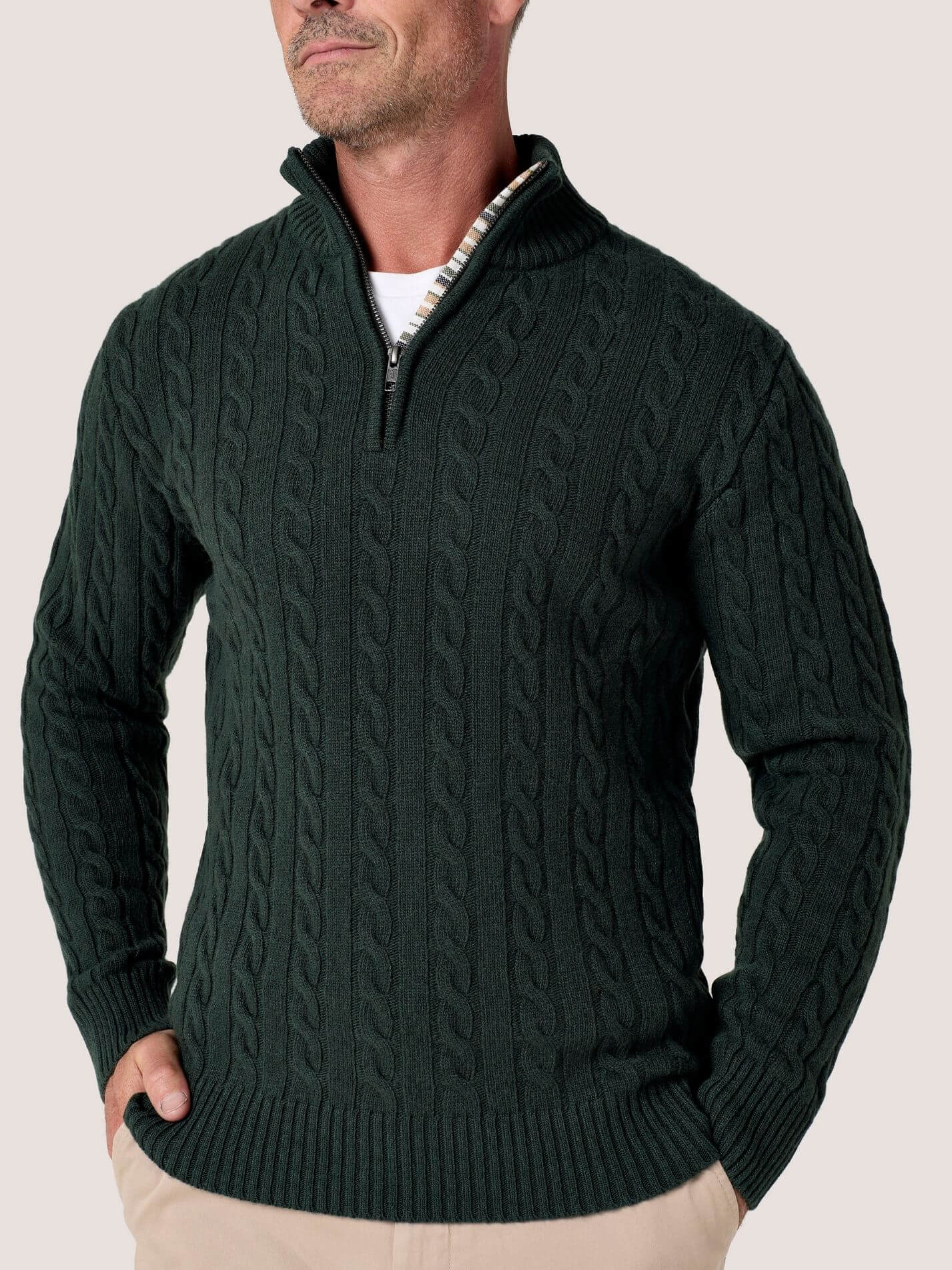 Pine Green cable knit quarter-zip jumper in Merino wool and cashmere, with Kenyan Kikoy trim inside the collar