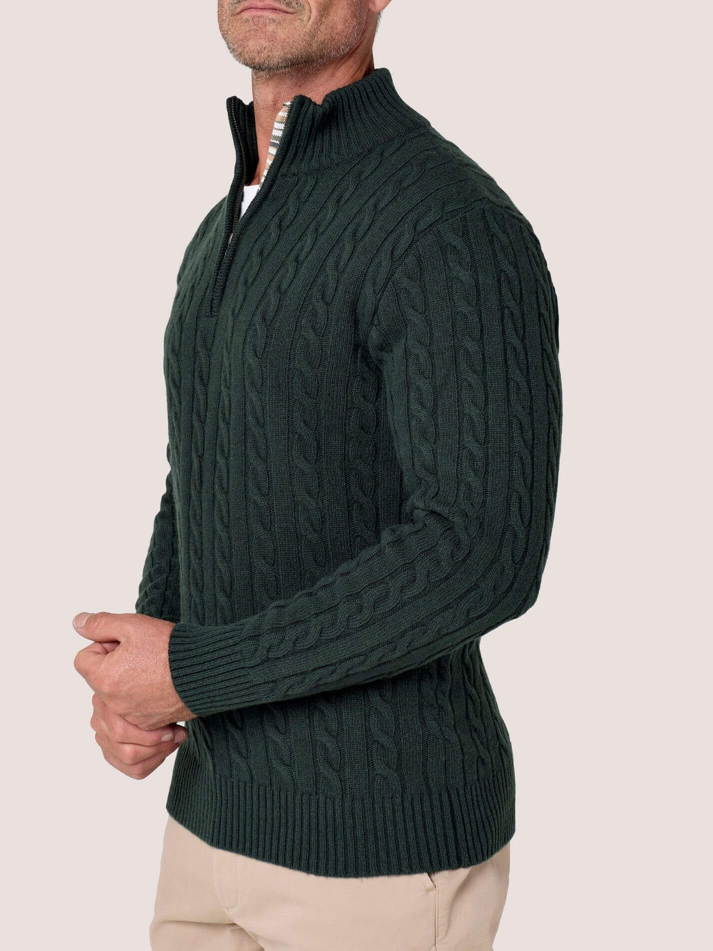 Pine Green cable knit quarter-zip jumper in Merino wool and cashmere, with Kenyan Kikoy trim inside the collar
