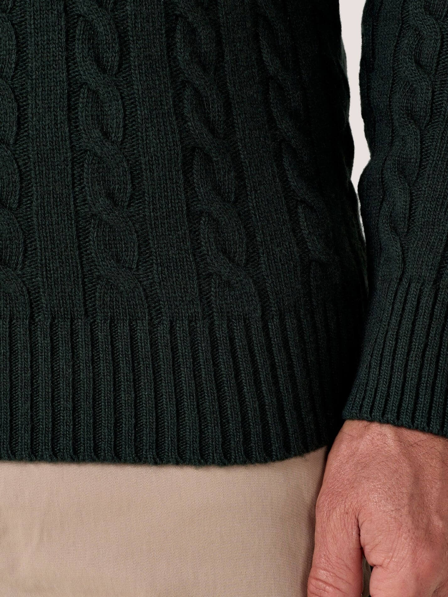 Pine Green cable knit quarter-zip jumper in Merino wool and cashmere, with Kenyan Kikoy trim inside the collar