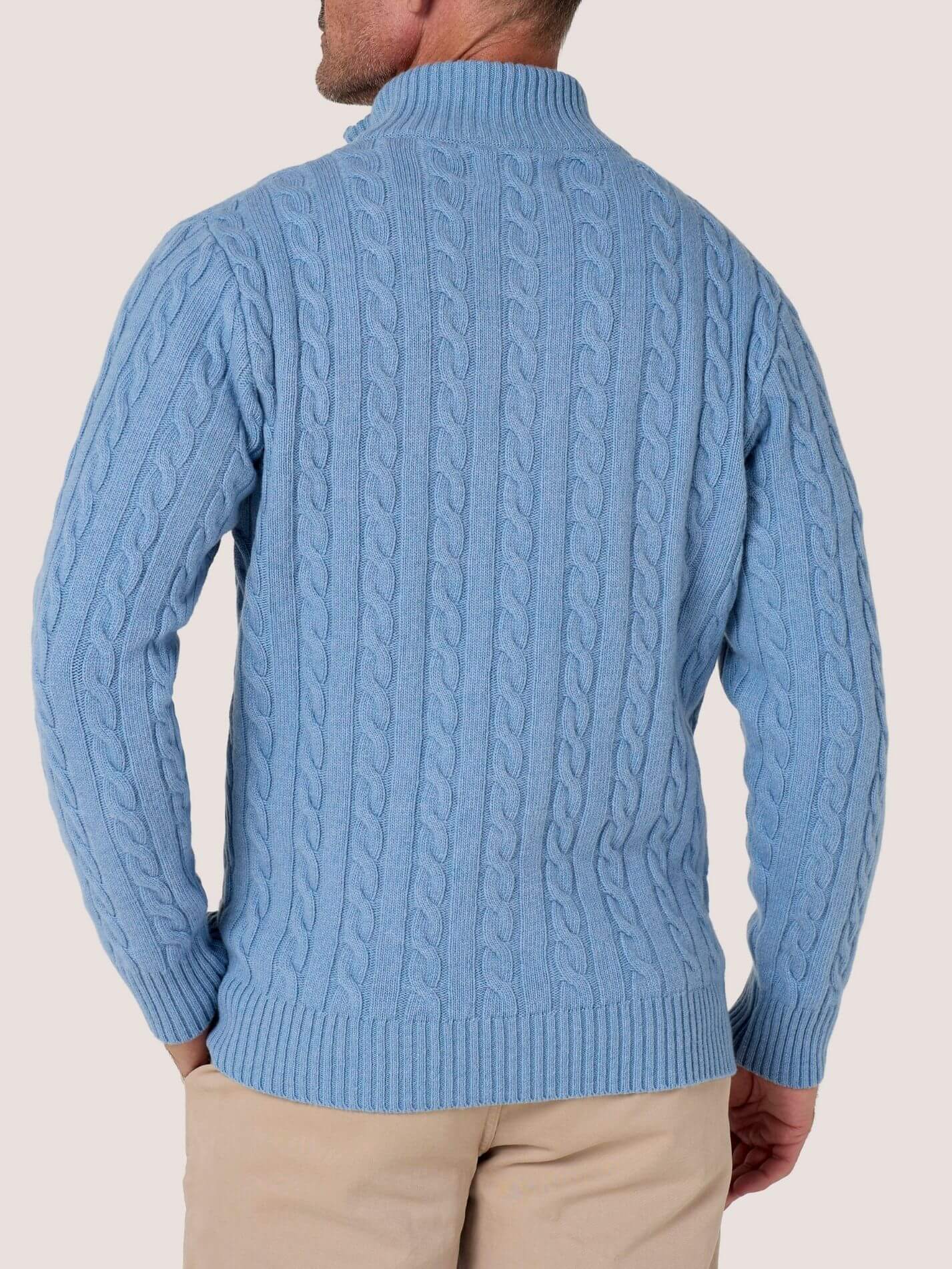 Powder Blue cable knit quarter-zip jumper in Merino wool and cashmere, with Kenyan Kikoy trim inside the collar