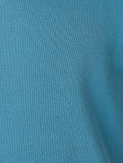 Slate Blue short-sleeve Cotton Piqué polo shirt, Kenyan Kikoy trim on the front placket and collar