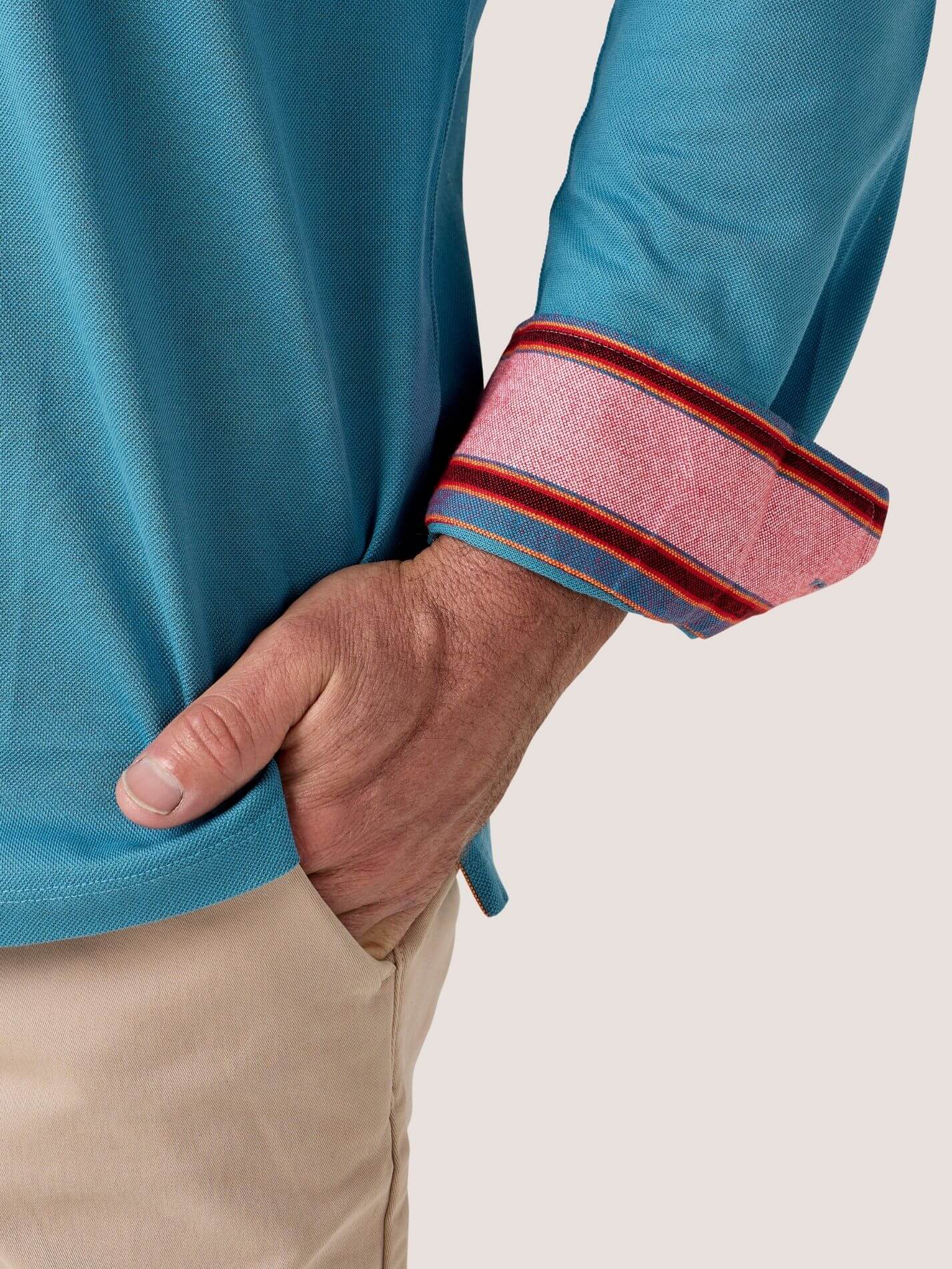 Slate Blue long-sleeve Cotton Piqué polo shirt, Kenyan Kikoy trim on the front placket, cuffs and collar
