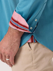 Slate Blue Cotton Piqué shirt with cutaway collar, Kenyan Kikoy trim inside the collar, cuffs and side gusset