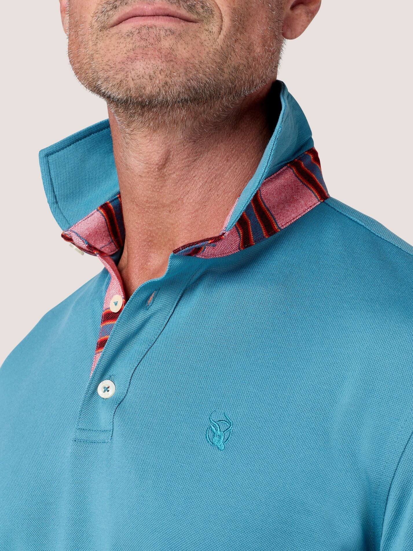 Slate Blue short-sleeve Cotton Piqué polo shirt, Kenyan Kikoy trim on the front placket and collar