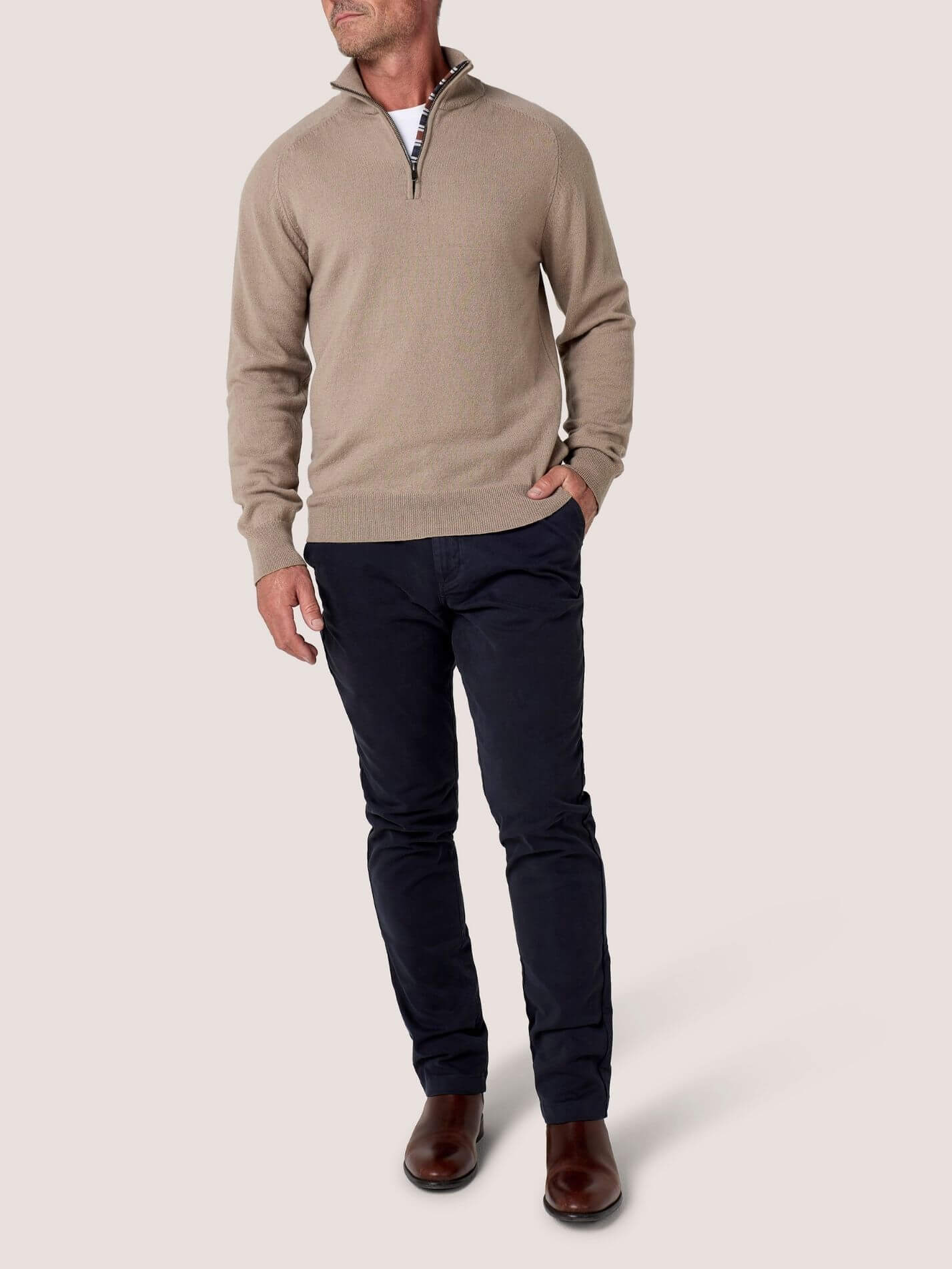Stone quarter-zip jumper in 100% Merino wool, with Kenyan Kikoy trim inside the collar
