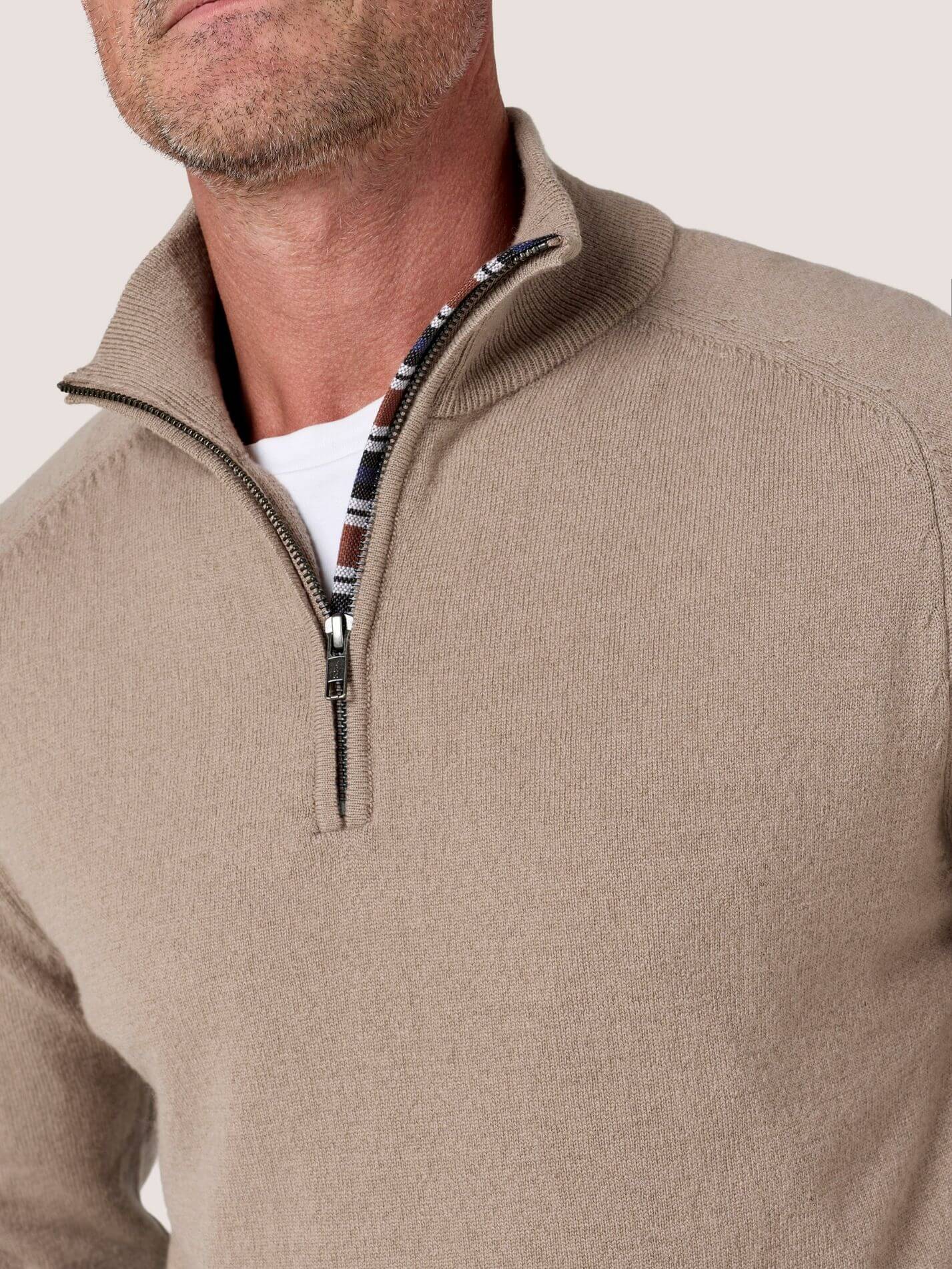 Stone quarter-zip jumper in 100% Merino wool, with Kenyan Kikoy trim inside the collar