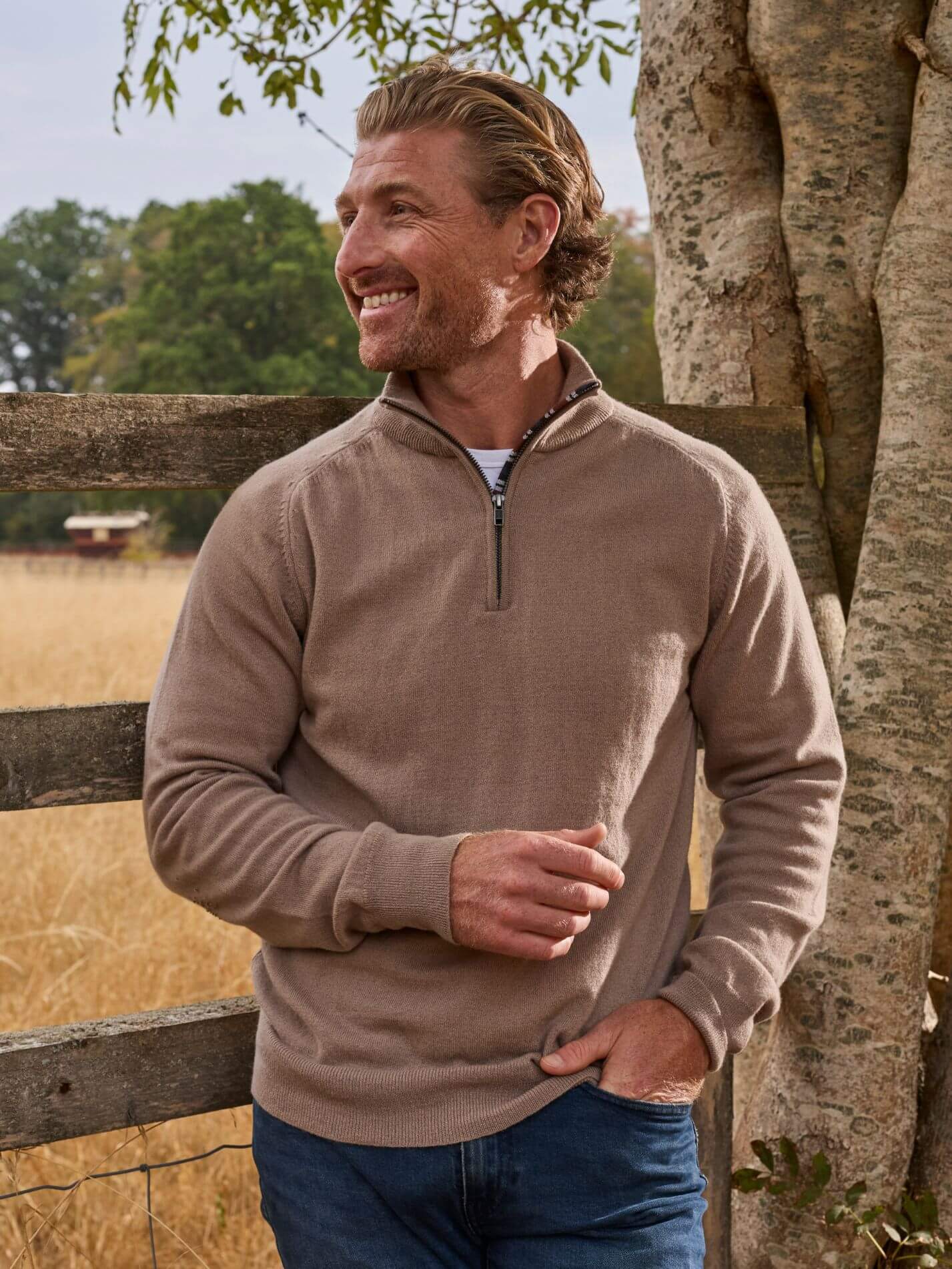 Stone quarter-zip jumper in 100% Merino wool, with Kenyan Kikoy trim inside the collar