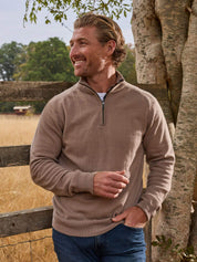 Stone quarter-zip jumper in 100% Merino wool, with Kenyan Kikoy trim inside the collar