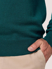 Teal quarter-zip jumper in 100% Merino wool, with Kenyan Kikoy trim inside the collar