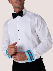 Koy white dress shirt with black bow tie, both cuffs folded back to show the blue Kikoy lining