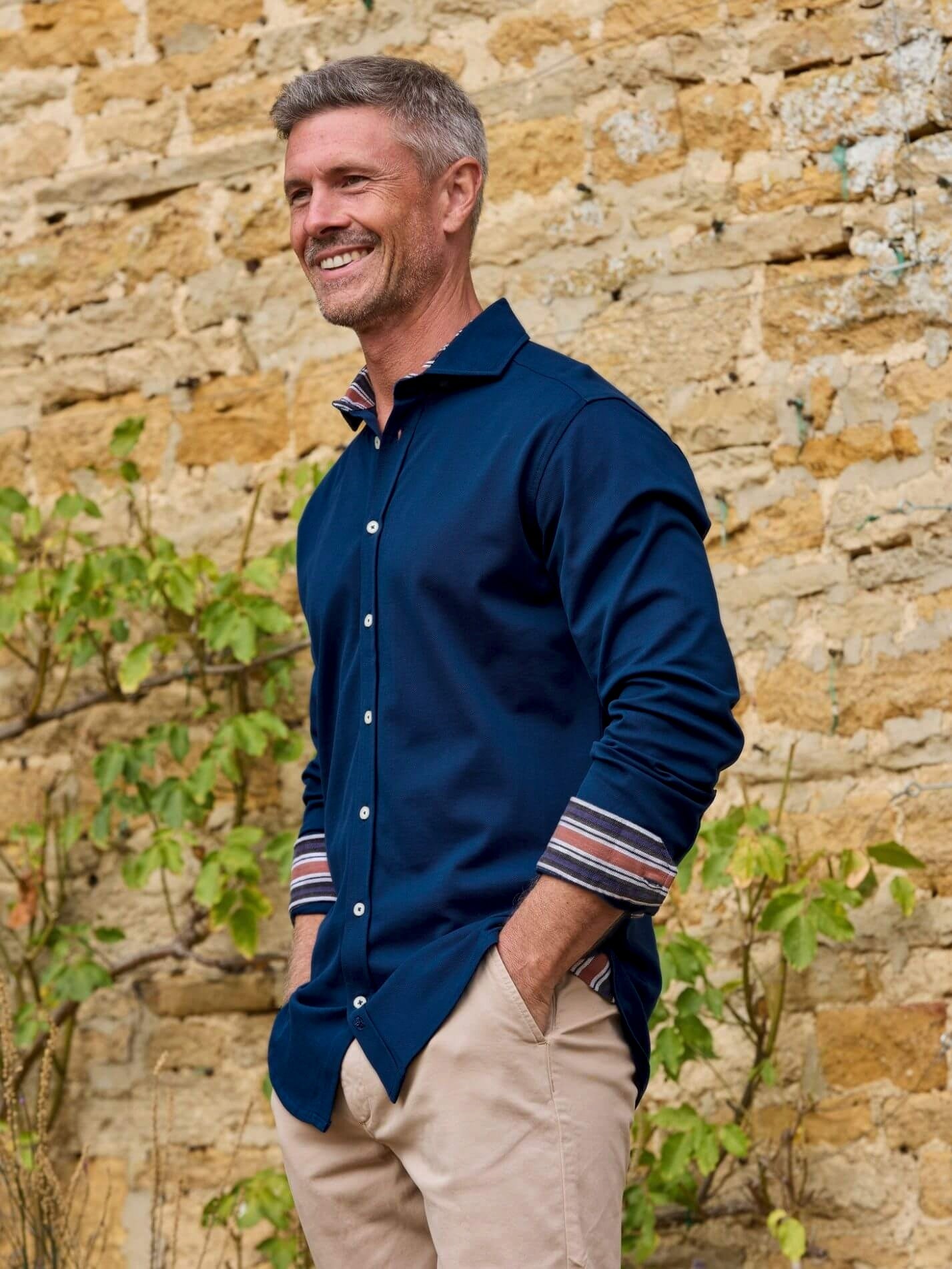 Navy Cotton Piqué shirt with cutaway collar, Kenyan Kikoy trim inside the collar, cuffs and side gusset