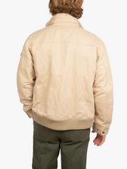 Ranger JacketThe Ranger Jacket by Koy Clothing. This is a beige bomber jacket with blue and white mottled Kenyan Kikoy fabric trim.