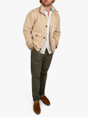 Ranger JacketThe Ranger Jacket by Koy Clothing. This is a beige bomber jacket with blue and white mottled Kenyan Kikoy fabric trim.